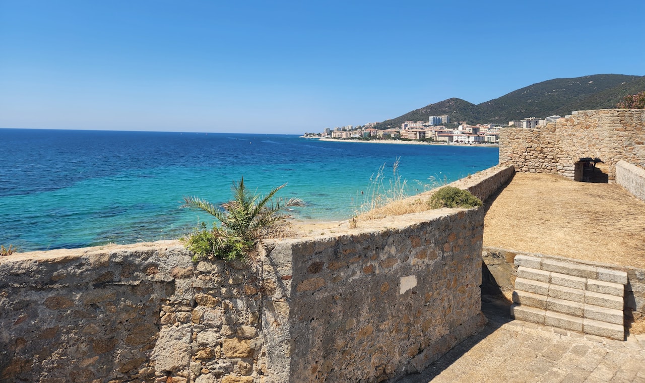 Ajaccio — a stone wall overlooking a body of water