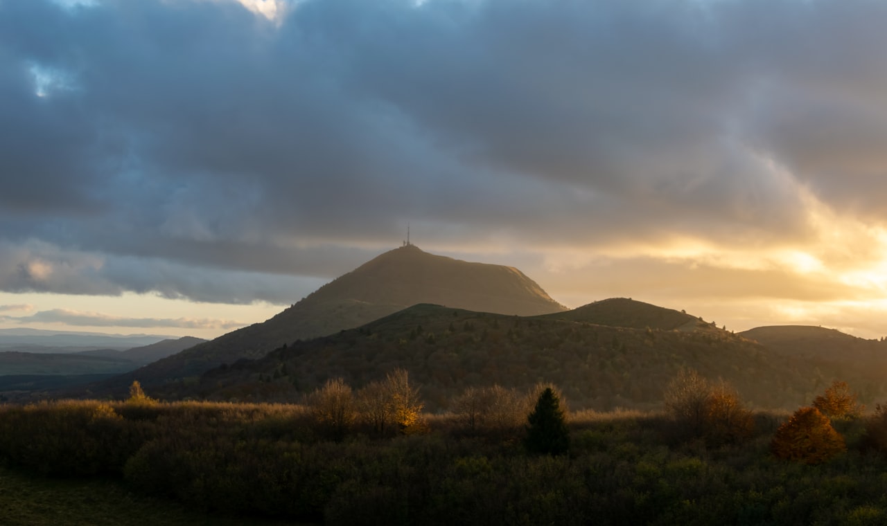 Clermont-Ferrand — the sun is setting over a mountain range