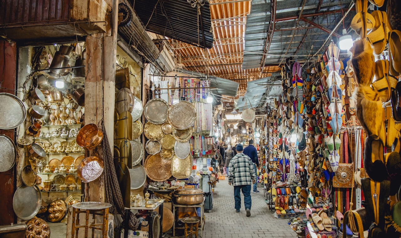 Marrakech — Bustling marketplace filled with various goods and shoppers