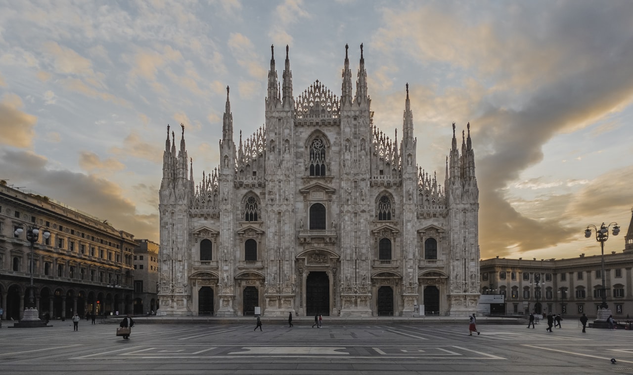 Milan — people walking near brown concrete building during daytime