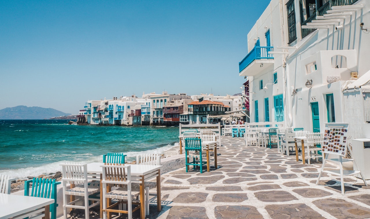 Mykonos — white and brown concrete buildings near sea during daytime