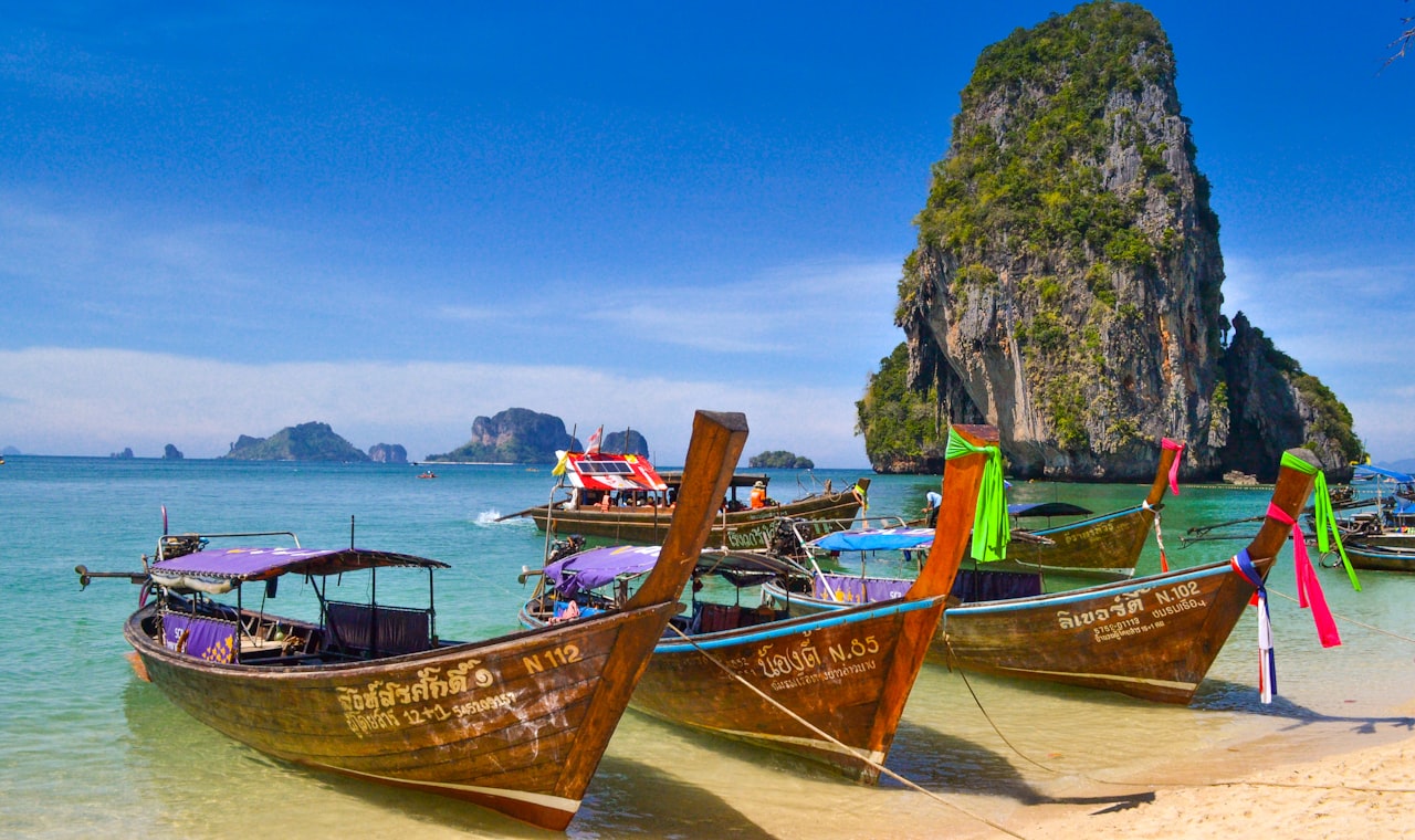 Phuket — five brown wooden boats